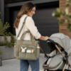 Organic Cotton Canvas Diaper Tote carried with detachable shoulder strap during stroller outing