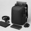 笔记本电脑包产品6展示图F Gaming laptop backpack displayed with computer and technology accessories